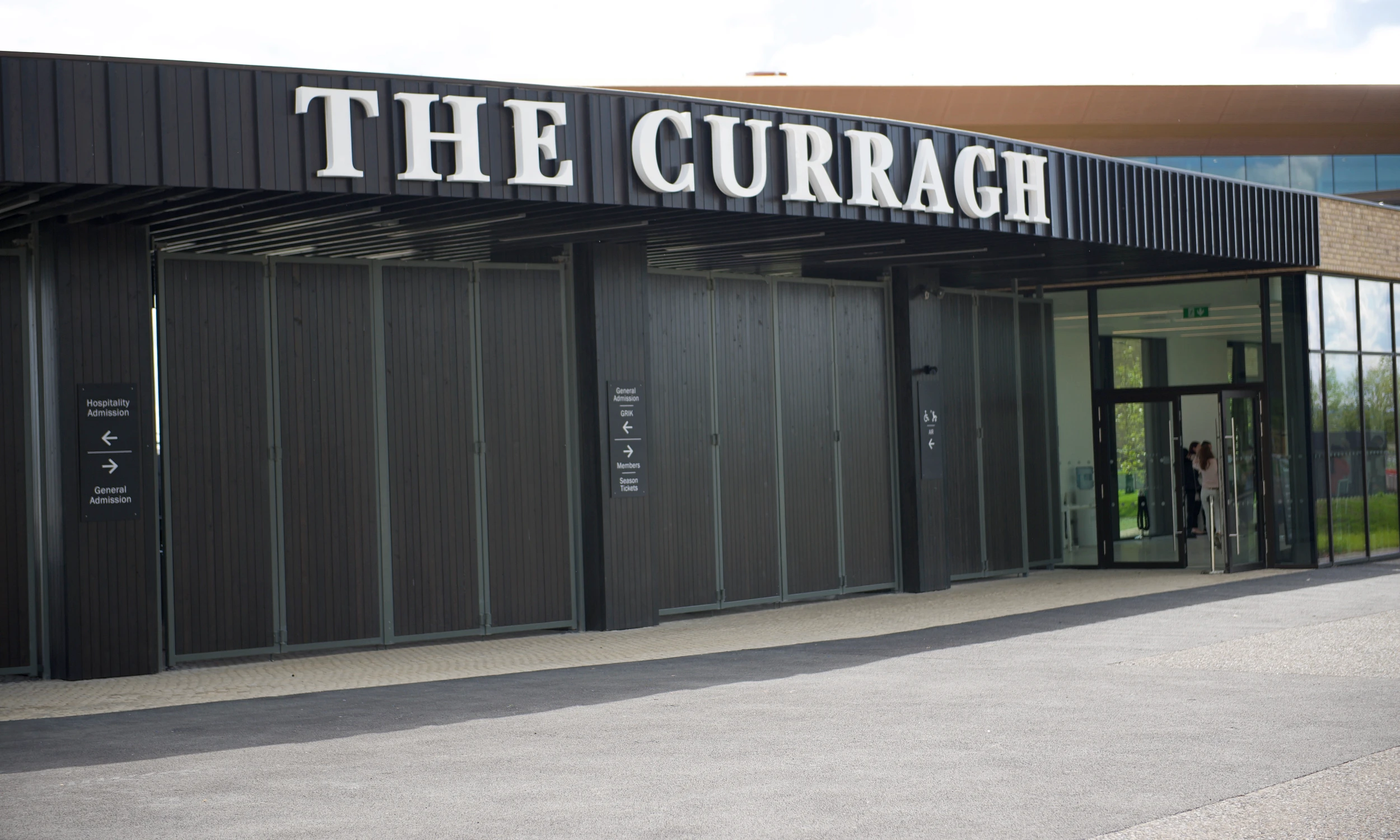 the curragh race course timber cladding in a dark colour